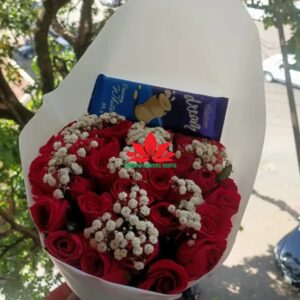 Red roses bouquet and chocolate