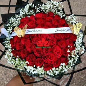 Red roses and gypsophila bouquet